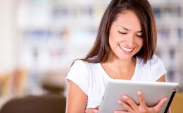 Woman reading on an e-book reader